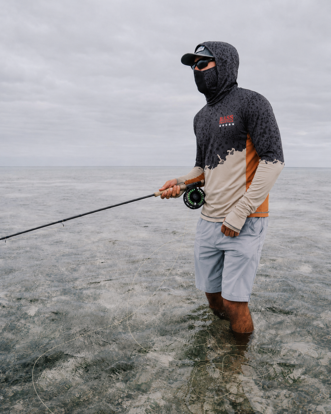 Catfish Camo Fishing Hoodie — angler wading the flats