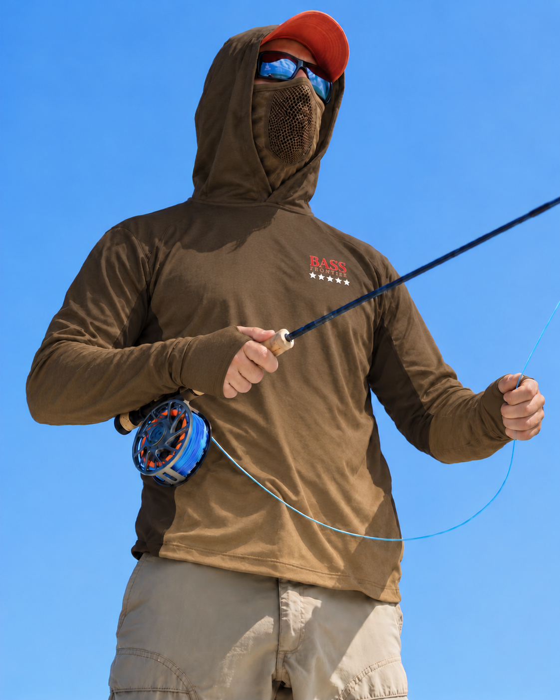 BassFrontier Brown Fishing Hoodie: Angler wearing the hoodie with face covering and thumbhole cuffs