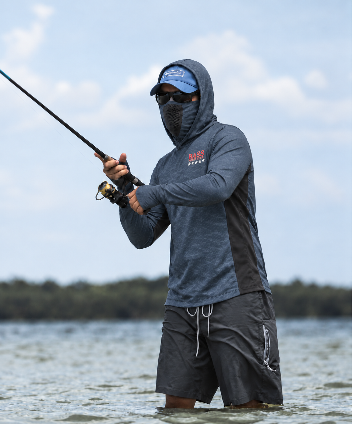 BassFrontier Slate Gray Fishing Hoodie: Angler wearing the hoodie with face covering and thumbhole cuffs